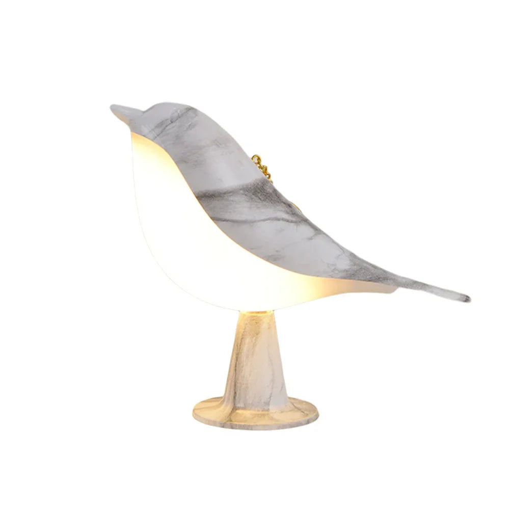 Lampe hélicoptère verte avec diffuseur d'arômes allumée dans une chambre d'enfant