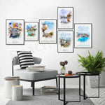 Un coin cosy avec une sélection de peintures murales représentant différentes destinations de voyage, créant une ambiance chaleureuse et inspirante dans cette pièce moderne.