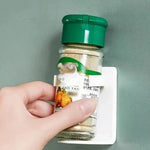 Étagère adhésive pour pots à épices