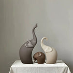 Comparaison taille figurines éléphant famille décoration animalière