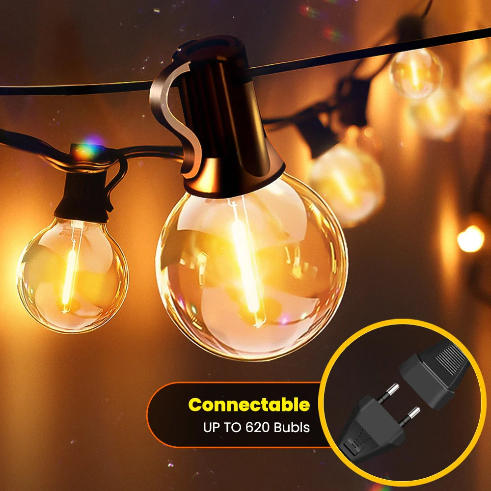 Guirlande lumineuse extérieure installée sur une pergola