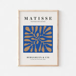 L'image représente une affiche d'art moderne avec le titre "MATISSE Papiers Découpés" et une illustration géométrique composée de formes bleues et dorées.