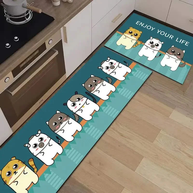 Tapis décoratif avec illustration colorée et amusante de petits personnages aux yeux de dessin animé, sur un fond bleu turquoise avec motifs géométriques, créant une atmosphère joyeuse et inspirante.