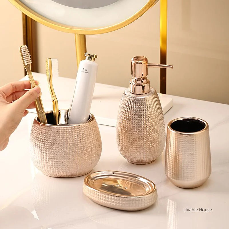 Ensemble accessoire salle de bain céramique or rose vue d'ensemble
