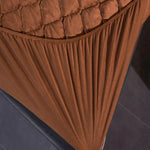 Détail du tissu velours matelassé de la housse