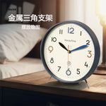 Horloge de table en couleur rouge sur fond neutre