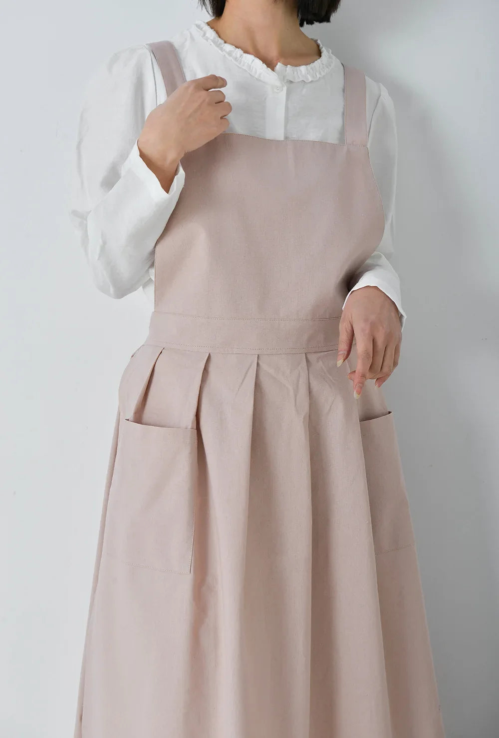 Détail du tissu en coton imperméable du tablier de cuisine