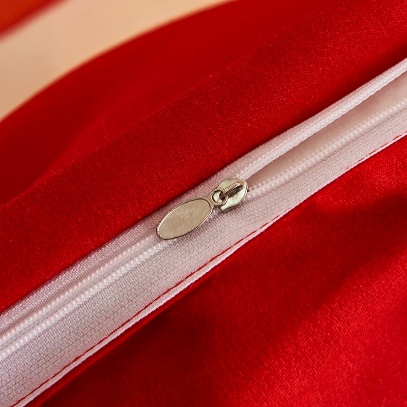 Housse de couette rouge sur lit double
