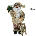 Figurine de décoration Père Noël 30cm sur nappe blanche