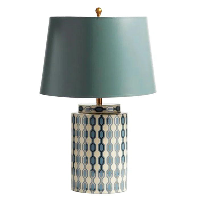 Lampe de chevet bleue en céramique style campagnard sur table de nuit