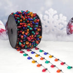 Detail des perles scintillantes sur la guirlande lumineuse de decoration