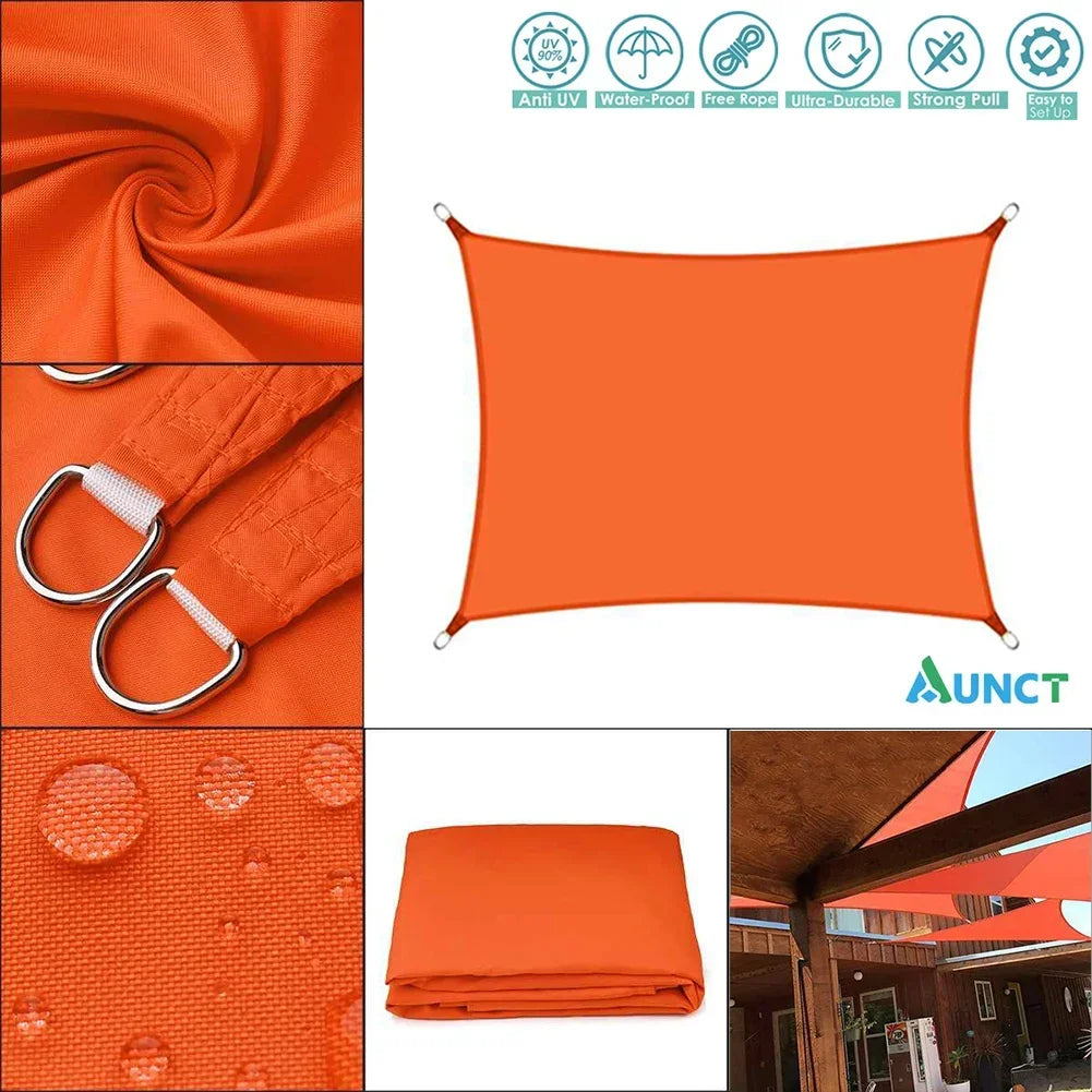 Voile d'ombrage orange dans un jardin avec mobilier d'extérieur
