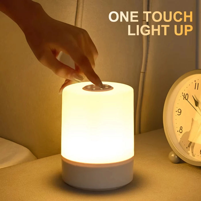 Lampe de chevet tactile sphérique bleue sur table de nuit