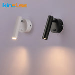 Applique murale LED aluminium noir avec interrupteur rotatif sur mur blanc