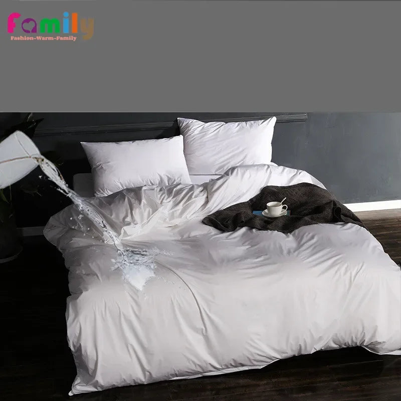 Housse de couette imperméable blanche sur lit double
