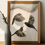 Ensemble de décoration murale oiseaux accroché sur un mur blanc