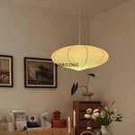 Luminaire suspension vu de côté montrant la longueur du cordon
