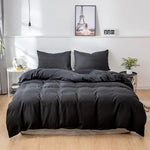 Housse de couette ivoire sur lit moderne