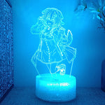 Lampe anime Hololive allumee en bleu clair sur une table de nuit