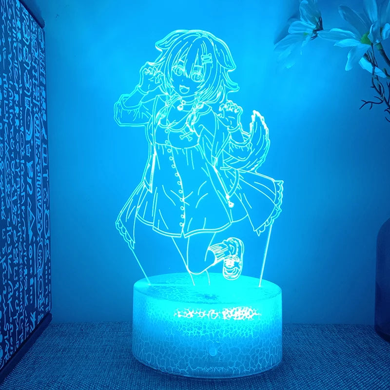 Lampe anime Hololive allumee en bleu clair sur une table de nuit