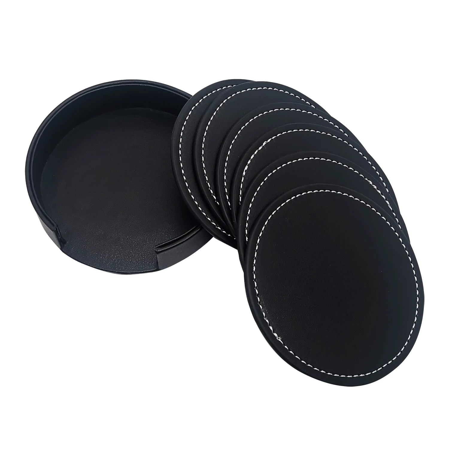 Coasters en cuir noir avec coutures apparentes, rangés dans un boîtier rond.