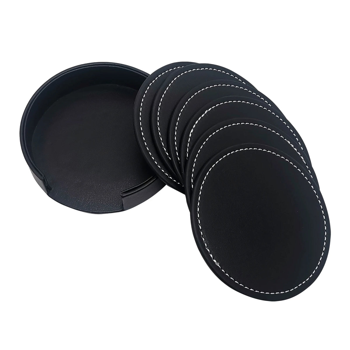 Ensemble de sous-verres ronds en cuir noir avec coutures blanches, dans un plateau de rangement.