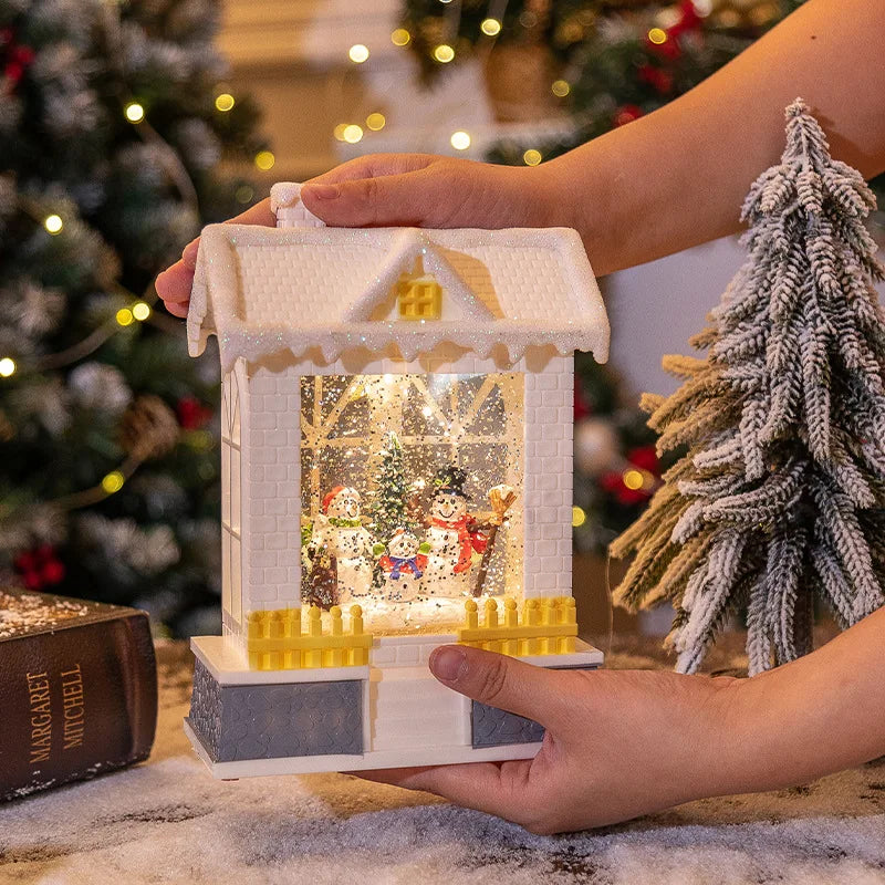 Globe de neige avec scène enneigée et lumière