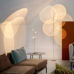Lampadaire LED projection sunset dans un intérieur cosy
