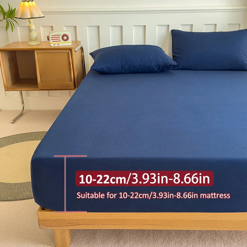 Drap de lit ajusté 180x200 cm en coton uni couleur blanc avec bande élastique visible