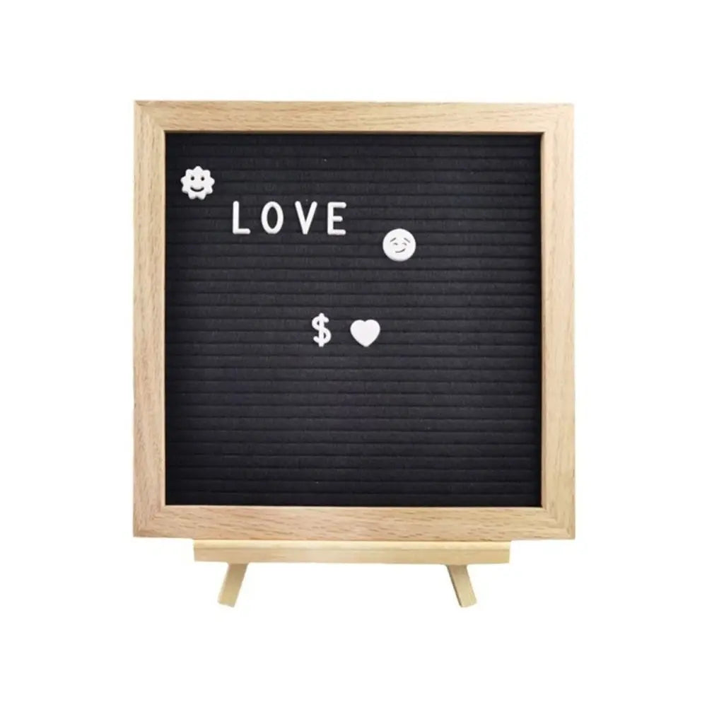 Tableau d'affichage en bois noir avec citation