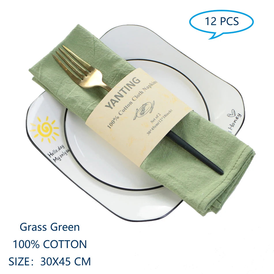 Serviettes de table en coton vert herbe, parfaites pour la décoration de table.