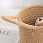 Panier suspendu en corde de coton rose pour décoration murale