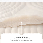 Rembourrage en coton moelleux recouvrant une surface de tissu doux et nappé.