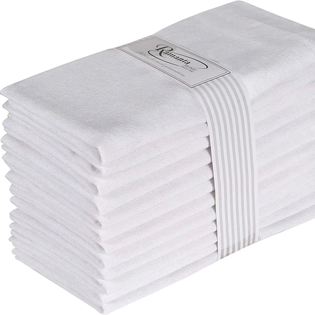 Ensemble de serviettes de cuisine blanches empilées avec un logo sur l'étiquette.