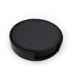 Un ensemble de sous-verres en cuir noir, pratique et élégant pour protéger vos surfaces.