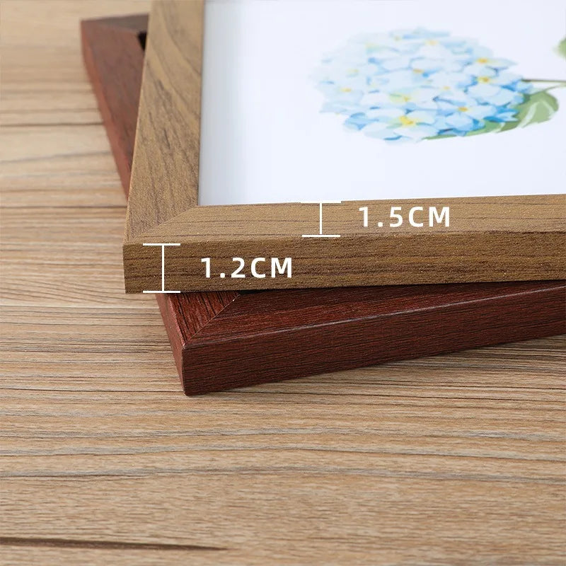 Cadre photo en bois 15x20 cm dans une galerie murale