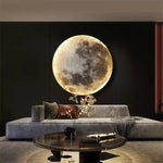 Applique murale LED Lune 3D éclairée en blanc chaud dans une chambre moderne