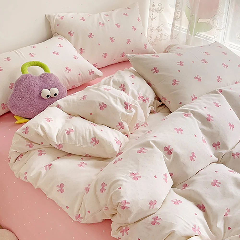 Ensemble housse de couette rose à nœud 3 pièces sur lit