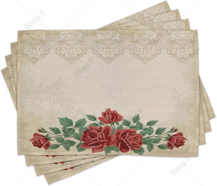Set de 4 sets de table en tissu lavable floral rose rouge sur une table en bois