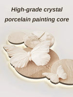 Horloge murale papillon grise vue de face