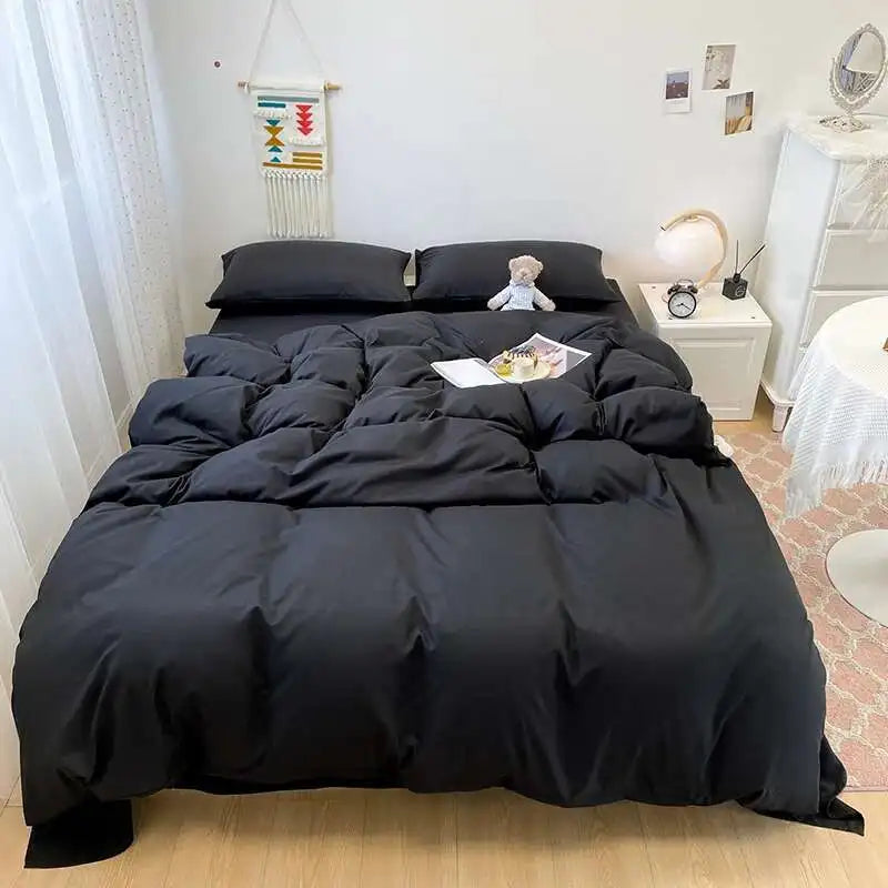 Housse de couette noire 220x240cm sur lit double moderne