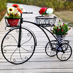 Support de fleur vélo en fer forgé rose