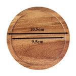 Dessous de verre en bois d'acacia avec verre posé