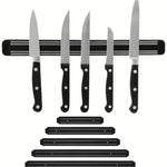 Porte-couteau mural magnétique noir sur mur de cuisine moderne