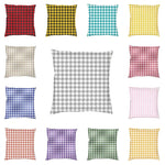 Housse de coussin vichy gris et blanc 40x40cm sur canapé moderne