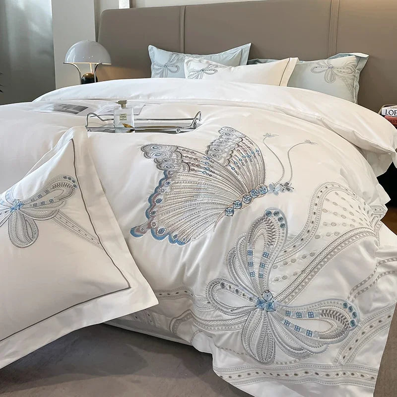 Drap plat et taies d'oreiller brodés papillons