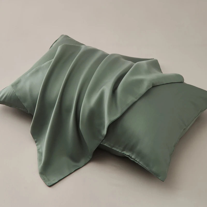 Parure de lit vert olive dans une chambre décorée style zen