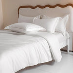 Housse de couette blanche en coton égyptien avec taies d'oreiller assorties