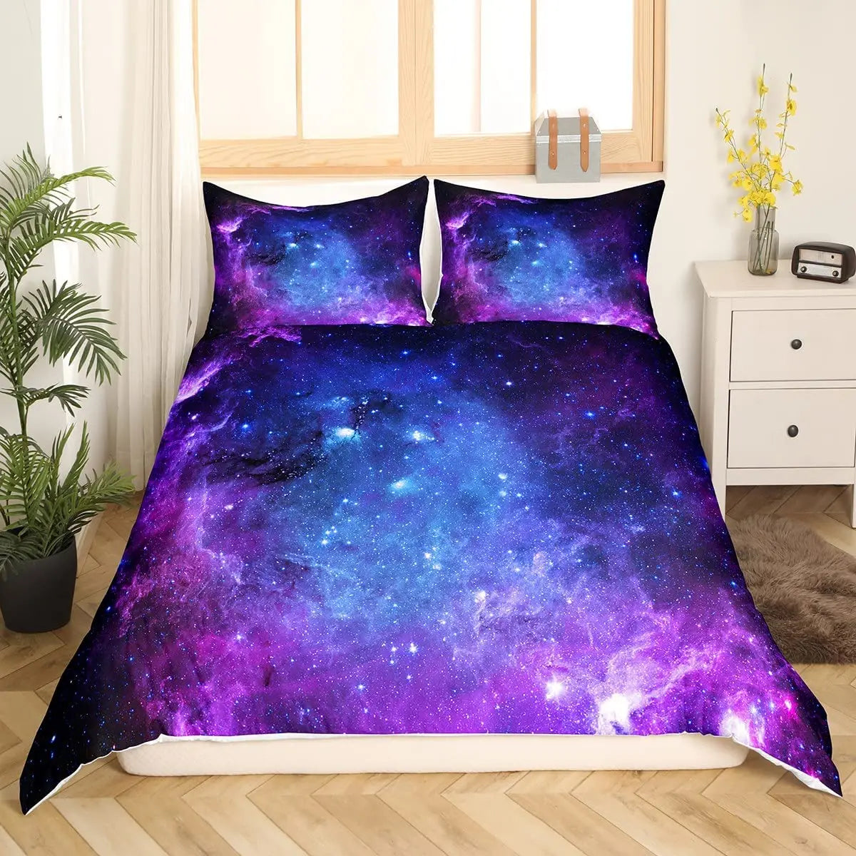 Détail de la housse de couette cosmos en microfibre douce montrant les étoiles