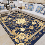 Tapis de salon bleu foncé orné de fleurs dorées épanouies.